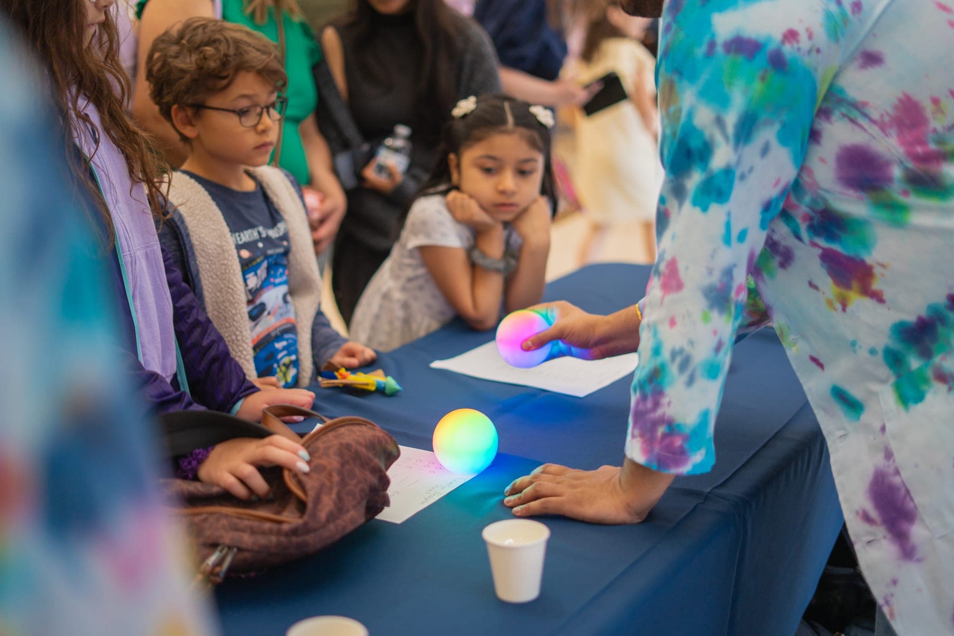 Engaged young learners at the quantum booth
